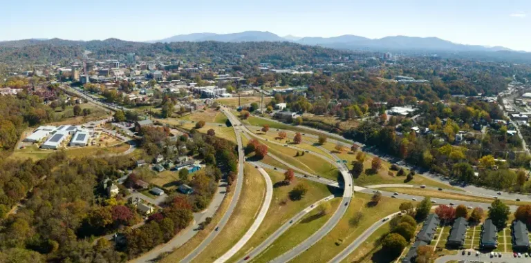 Aerial American Freeway Intersection Fall Season Asheville North Carolina Fast Moving Cars Trucks Transportation