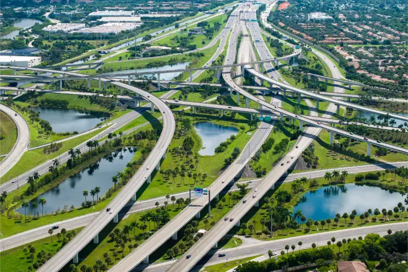 Aerial American Freeway Intersection Fast Driving Cars Trucks Miami Florida City Transportation