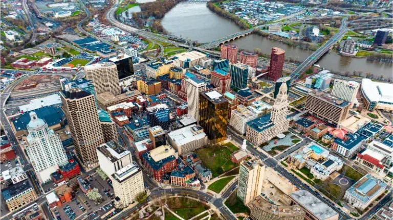 Downtown Hartford Connecticut Daytime River Floating Through City Backdrop Aerial Perspective