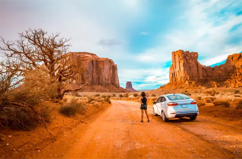 Female Driving Through Interior Monument Valley Utah