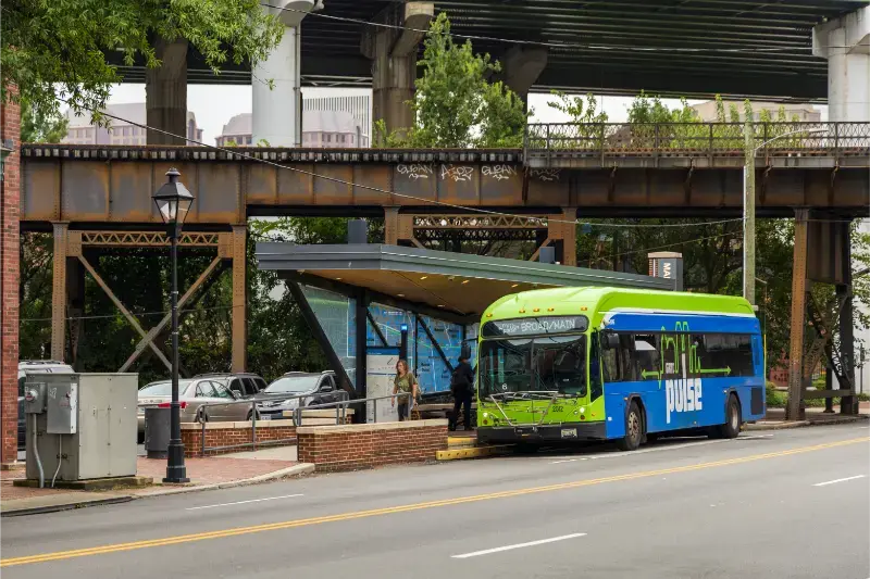 Green Blue Bus Driving Down Street Richmond Virginia