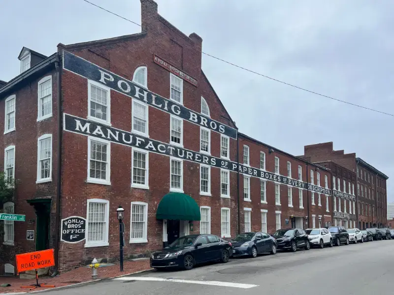Large Brick Building Sign That Says Pohlig Bros Richmond Virginia