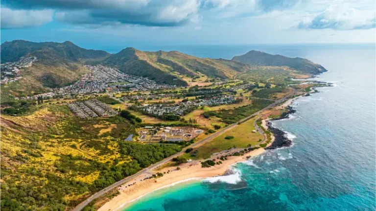 Ocean Meeting Land Bare Rocks Coast Curved By Waves Shore Oahu Hawaii Aerial
