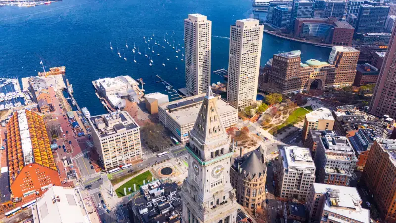 Two Similar Harbor Towers Boston Massachusetts City Tallest Buildings Backdrop Blue Waterscape Aerial
